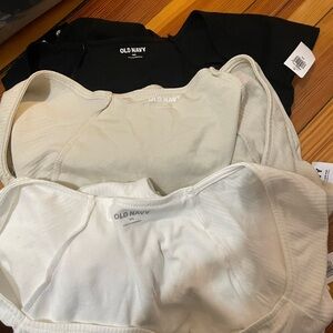 Old Navy Black, Cream, and White Body suits.